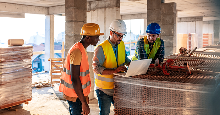 Construction workers in an office building